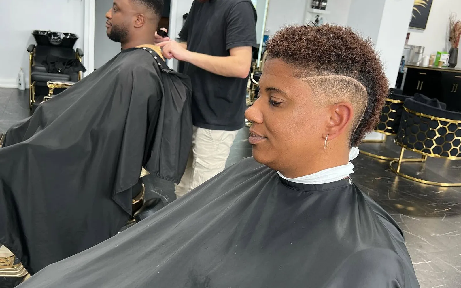 Close-up of a skin fade being blended at S Blends